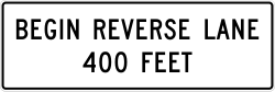 The point ahead where a reversible lane changes direction