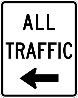 Requires all traffic to turn left at this location