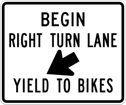 Beginning of right turn lane with requirement to yield to bicycles