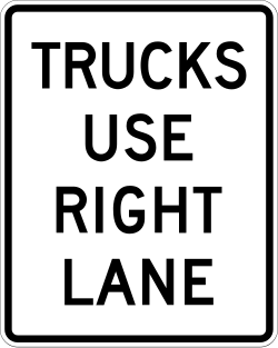 Directs trucks to use the right lane