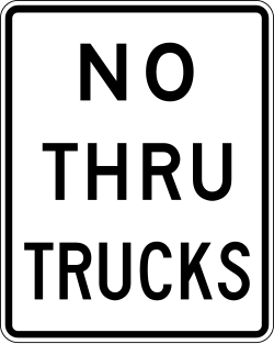 Prohibits through truck traffic; local delivery permitted