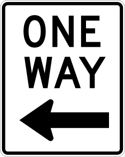 One-way traffic flow to the left with directional arrow