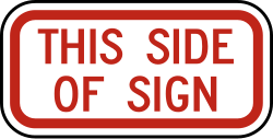 Supplemental plaque indicating parking restriction applies to this side of the sign