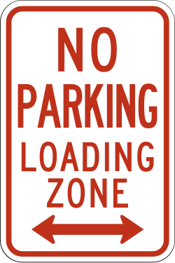Prohibits parking in designated loading zone area