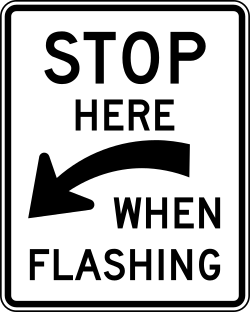Alternative design requiring drivers to stop when signal is flashing