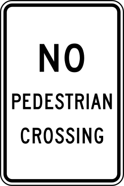 Pedestrians may not cross at this location