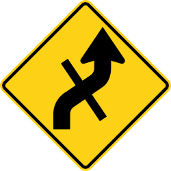 Reverse curves starting right with a crossroad intersection