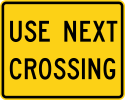 Supplemental plaque directing to use next crossing