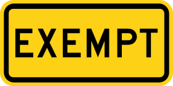 Supplemental plaque indicating exempt vehicles from railroad crossing requirements