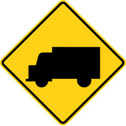 Truck crossing or heavy truck activity ahead