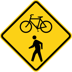 Bicycle and pedestrian crossing area ahead