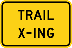 Supplemental plaque for trail crossing