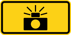 Supplemental plaque with photo enforcement symbol