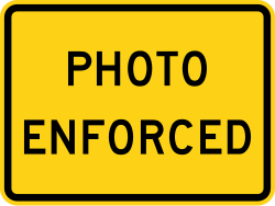 Supplemental plaque indicating photo enforcement