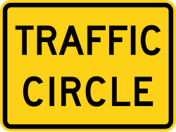 Supplemental plaque for traffic circle