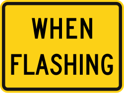Supplemental plaque indicating 'When flashing'