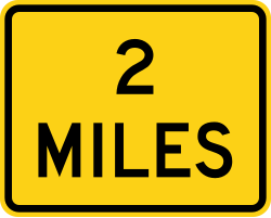 Supplemental plaque showing distance in miles