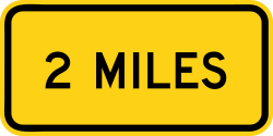 Supplemental plaque showing distance in miles