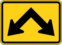 Supplemental plaque with dual downward diagonal arrows