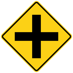 Four-way intersection or crossroad ahead