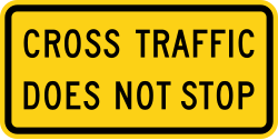 Supplemental plaque indicating cross traffic does not stop