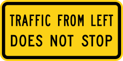 Supplemental plaque indicating traffic from the left does not stop