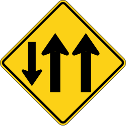 Two-way traffic on a 3-lane road with one lane in the opposing direction