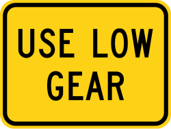 Supplemental plaque advising to use low gear