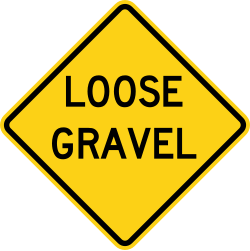 Loose gravel on the road surface
