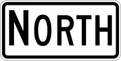 Cardinal direction plaque indicating North direction