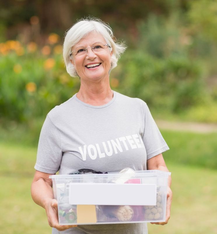 volunteer with donation box