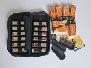 Set of C.A. Seydel Söhne harmonicas (12 pcs. + case)