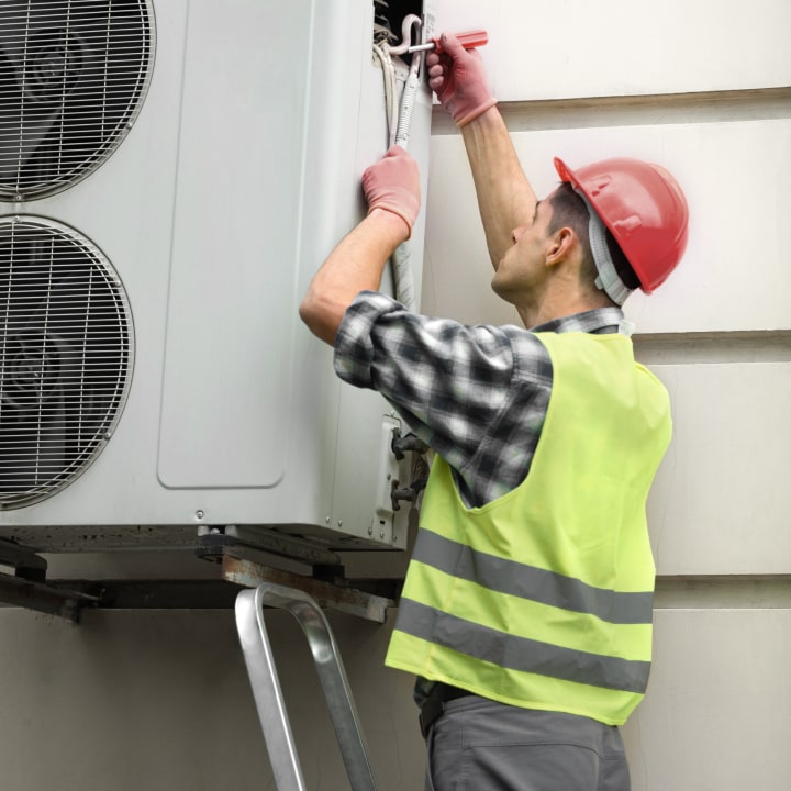 hvac professional handling seasonal surge