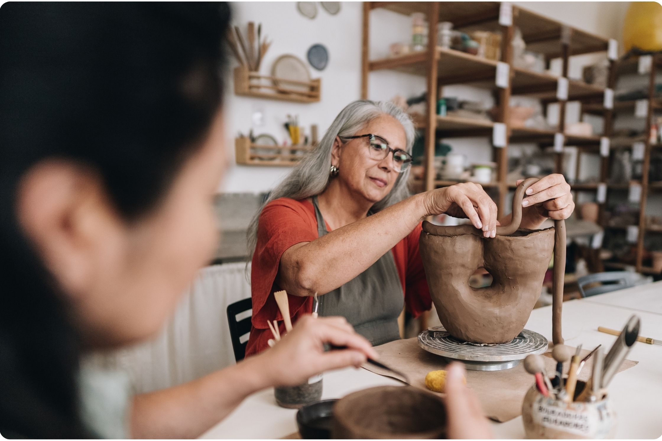 two women, pottery class