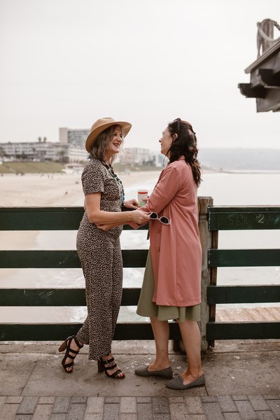 women chatting at seaside.jpg