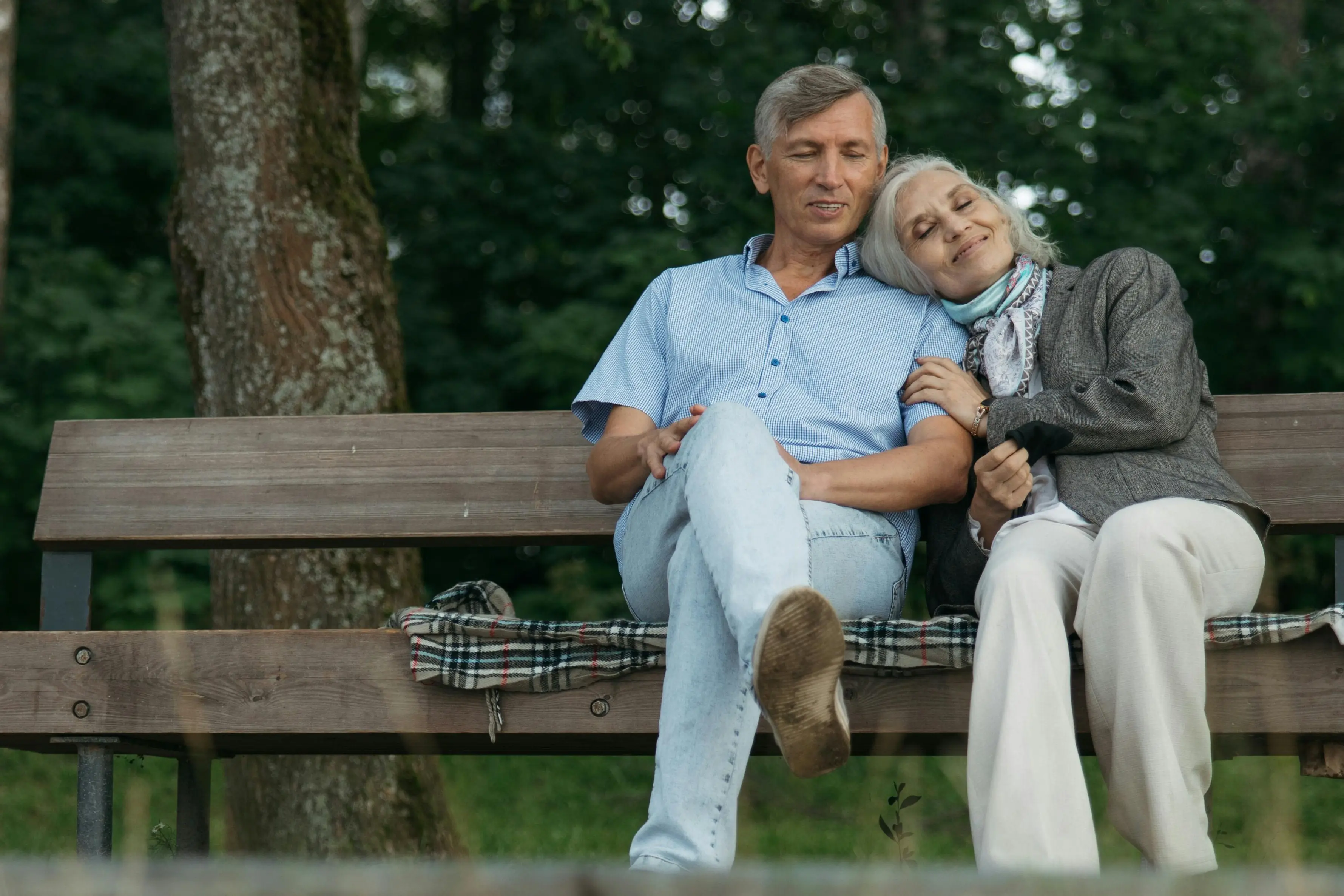 An elderly couple on the bench