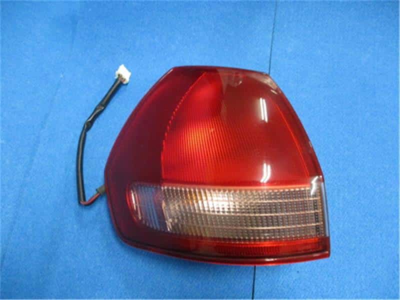 Left Tail Light NISSAN Wingroad 2002 UA-WHNY11 26555WE025 — photo 1