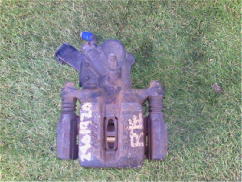 Rear Left Brake Caliper SUZUKI Swift 2006 CBA-ZC31S — photo 1