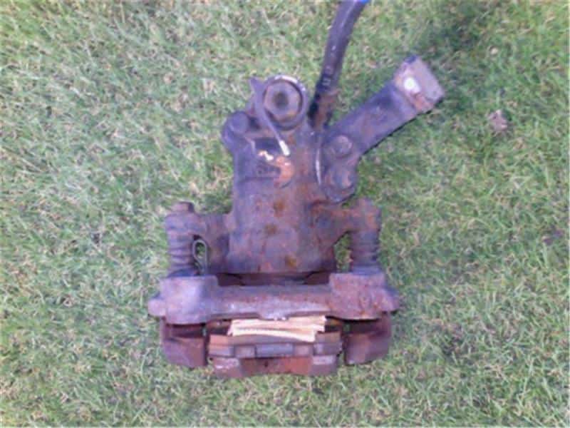 Rear Left Brake Caliper SUZUKI Swift 2006 CBA-ZC31S — photo 2