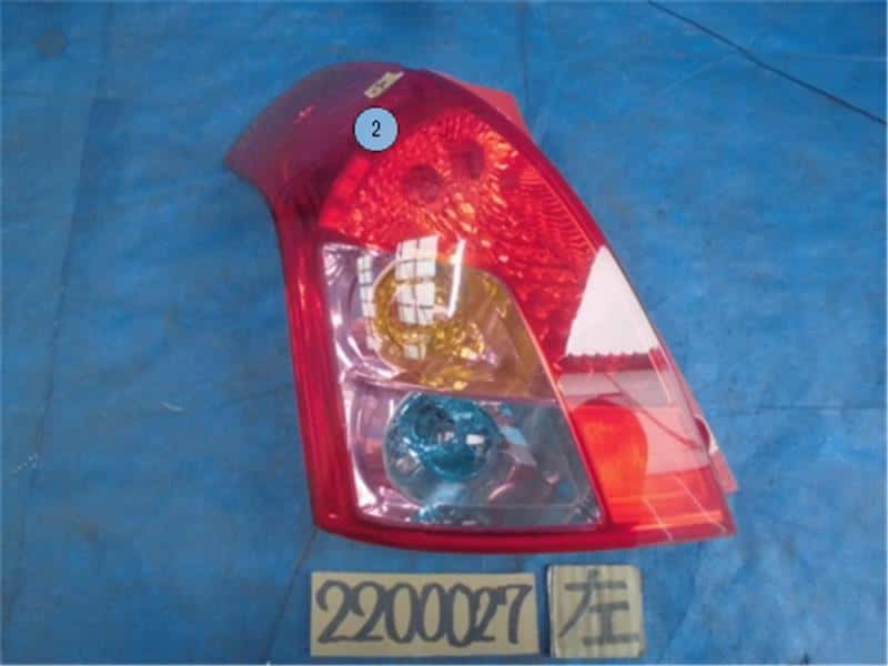 Left Tail Light SUZUKI Swift 2007 DBA-ZD11S 3567073K00 — photo 1