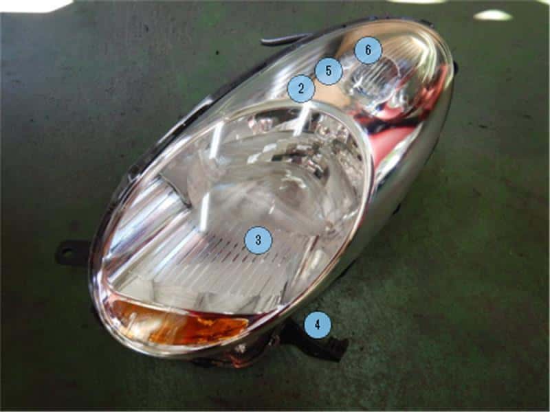 Left Headlight NISSAN March 2009 DBA-AK12 — photo 1