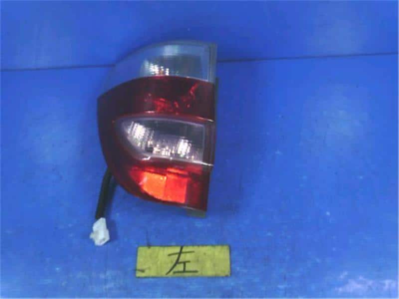 Left Tail Light HONDA Zest 2008 DBA-JE1 — photo 1