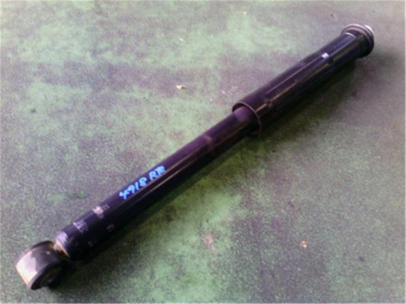 Rear Left Shock Absorber TOYOTA Vitz 2006 DBA-SCP90 — photo 1