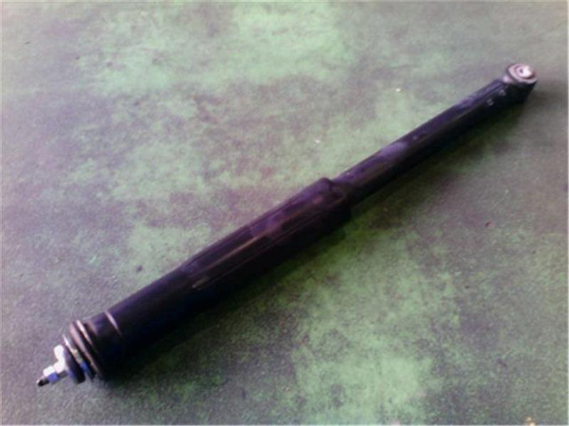 Rear Left Shock Absorber TOYOTA Vitz 2006 DBA-SCP90 — photo 2