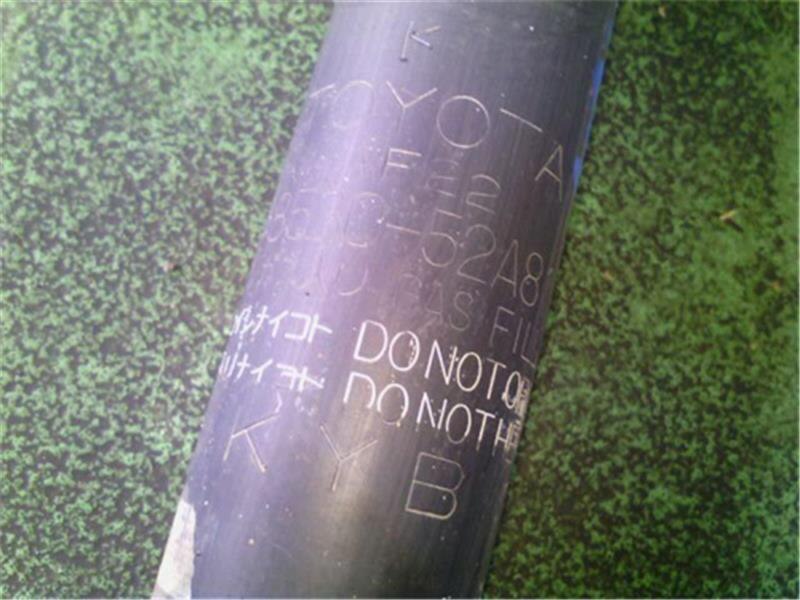 Rear Left Shock Absorber TOYOTA Vitz 2006 DBA-SCP90 — photo 5