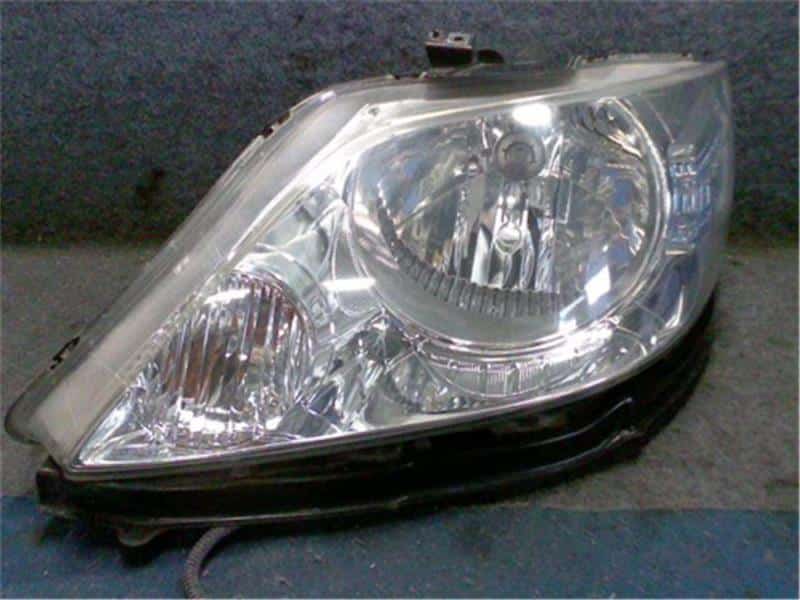 Left Headlight HONDA Fit Aria 2007 DBA-GD8 — photo 1