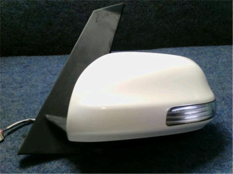 Left Side Door Mirror TOYOTA Ractis 2006 DBA-NCP100 — photo 1
