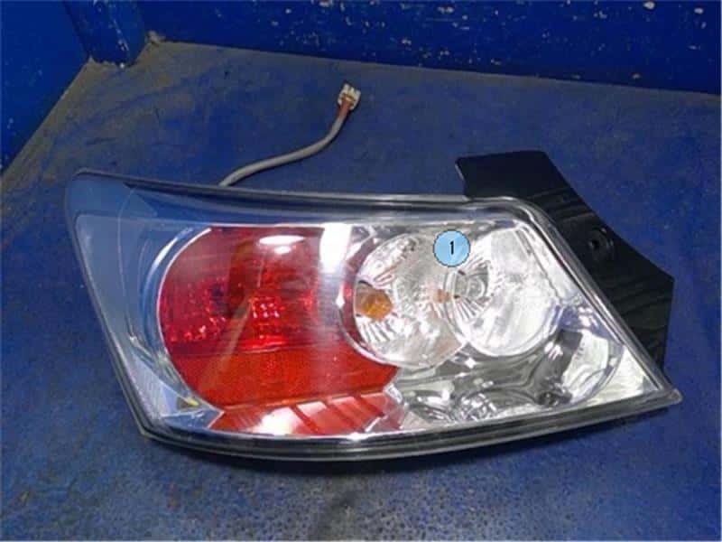 Left Tail Light TOYOTA bB 2009 DBA-QNC20 — photo 1