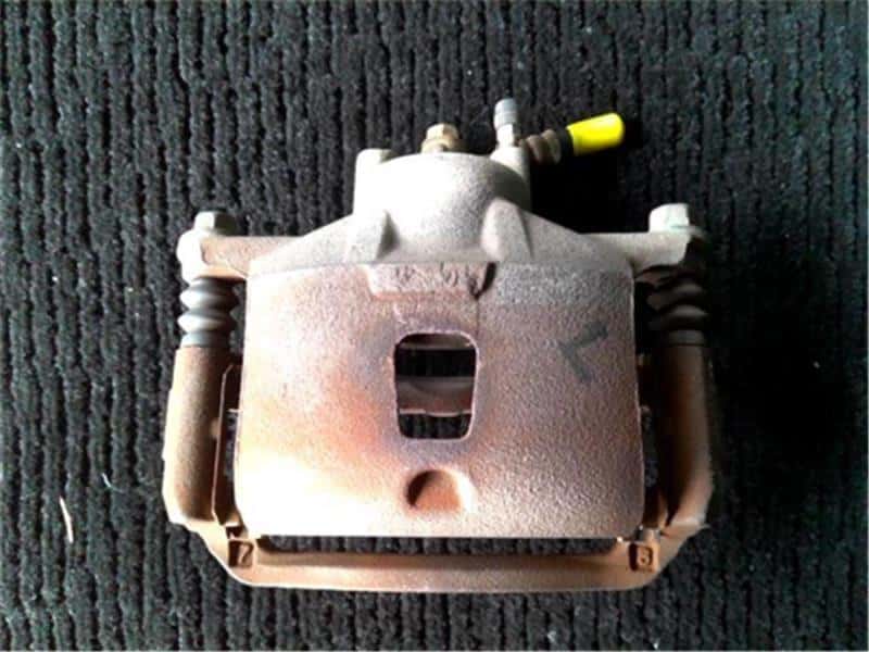 Front Left Brake Caliper NISSAN Note 2007 DBA-E11 — photo 1