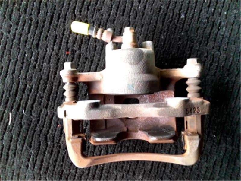 Front Left Brake Caliper NISSAN Note 2007 DBA-E11 — photo 2